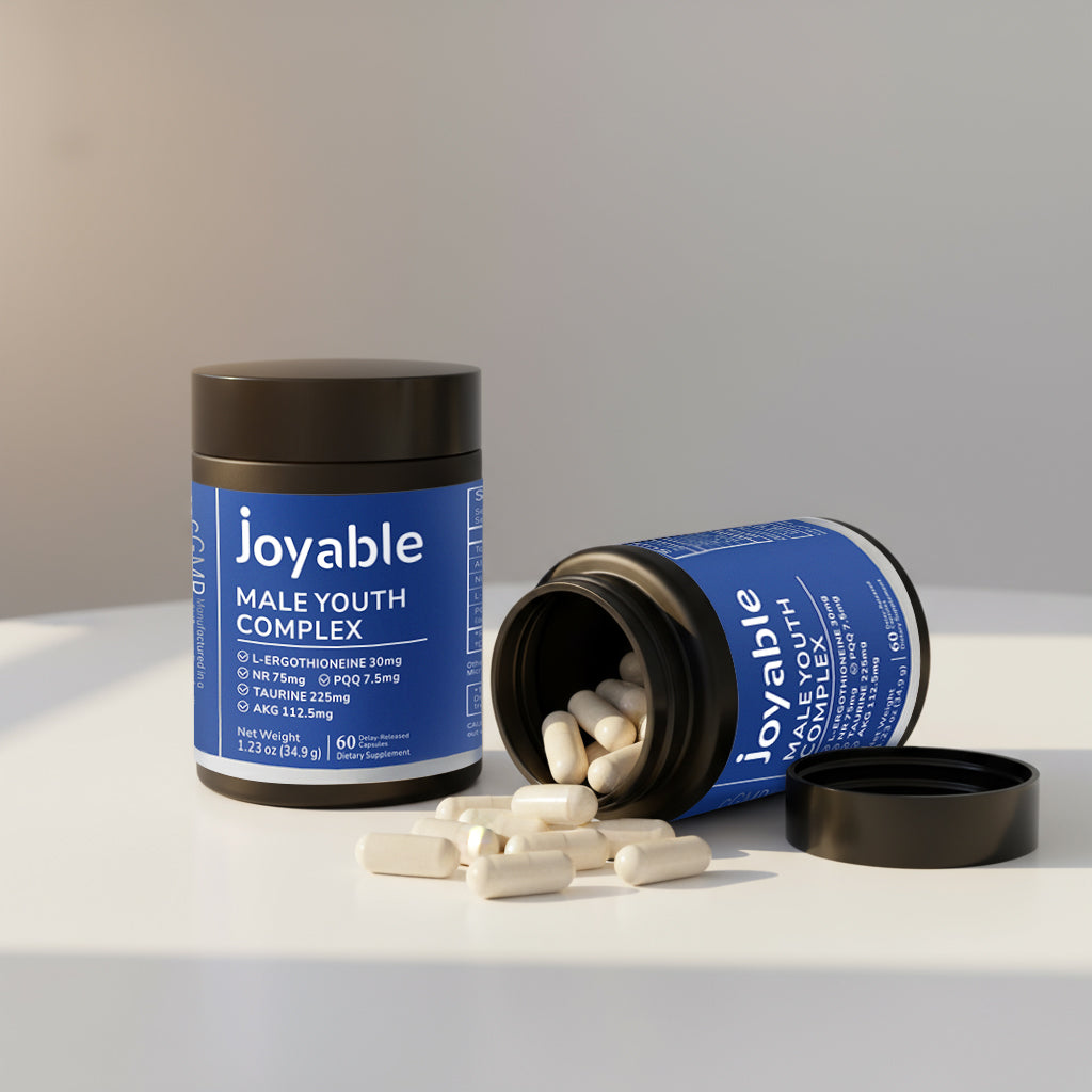 two-containers-of-joyable-male-yout-complex-with-one-jar-upright-and-the-other-tilted-open
